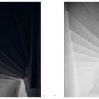 Die Zahlen 48 und 49 stehen unten. Links und rechts sind abstrakte spiralförmige Treppenaufnahmen, dunkel und hell.