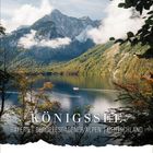 KÖNIGSSEE. Bayern | Berchtesgadener Alpen | Deutschland. Oktoberkalenderblatt. Malerischer See vor Bergkulisse mit Booten.