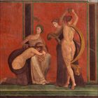 Zahlenreihe: 10 bis 31. Fresko mit vier antiken Figuren in einer Szene mit roten und grünen Elementen.