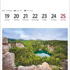 Juli, 29. Woche: 19-25. Bild: Gypsum Mine bei Chéticamp, Nova Scotia. Blick auf bewaldete Berge und einen grünen See.