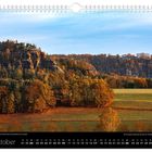 Oktoberkalender: Landschaft mit herbstlichen Bäumen und Felsen. Kalendertage darunter, der 03.10. und 31.10. markiert.