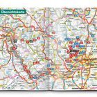 „Übersichtskarte“ steht oben links. Städte und Routen in der Region um Frankfurt sind farbig markiert und nummeriert.