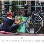 Text: "Street Art", "11".  
Eine Person malt am Kanal, ein Fahrrad lehnt an der Brücke.