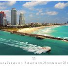 „Miami South“ unten links, Kalenderzahlen, Monat 11. Skyline und Strand von Miami mit blauem Himmel und grünem Meer.