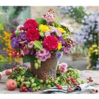 "11" in großen roten Zahlen. Bunter Blumenstrauß mit roten, gelben und lila Blüten in einem dekorativen Topf.