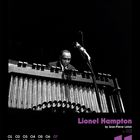 „Lionel Hampton by Jean-Pierre Leloir“ steht neben einem Vibraphon-Spieler; im Hintergrund ein Mikrofon. Kalender unten.