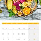 Kalendertage vom November 2027. Oben exotische Früchte auf Holzplatte, darunter der Monatskalender.