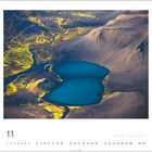 Text: "11" (Kalenderreihe), "Foto: Josef Schäfer" oben. Landschaftsaufnahme eines blauen Sees mit gelben Uferabschnitten.