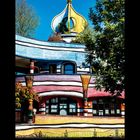 1 2 3 4 5 6 7 8 9 10 11 12 13 14 15 16 17 18 19 20 21 22 23 24 25 26 27 28 29 30, XI 2027, farbenfrohes Gebäude mit goldener Kuppel.