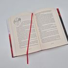 Aufgeschlagenes Buch auf Seite 210-211, Kapitelüberschrift "33". Rotes Lesebändchen in der Mitte.