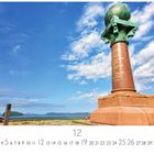 Struve Bogen Hammerfest. Landschaft mit Denkmal, Himmel mit Wolken, Meer im Hintergrund, Monatskalender für Dezember.