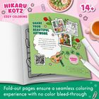 Auf dem Tisch liegt ein aufgeschlagenes Malbuch. Texte inklusive "SHARE YOUR BEAUTIFUL ARTWORK". Buntstifte daneben.