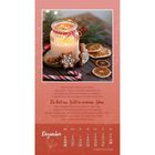 "Weihnachten erinnert uns daran...Du bist ein Licht in meinem Leben...Dezember." Eine brennende Kerze mit Lebkuchen und Deko.