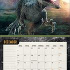 Kalender für Dezember. Ein Velociraptor in einer Landschaft mit Bergen und einem Dino-Logo oben rechts.
