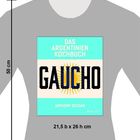 "Das Argentinien Kochbuch GAUCHO Anthony Ekizian" steht auf einem T-Shirt mit den Maßen 50x21,5x26 cm.