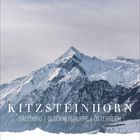 "Kitzsteinhorn, Salzburg | Glocknergruppe | Österreich" steht über einem schneebedeckten Berg unter bewölktem Himmel.