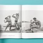 Texte: "Franco Columbu joins Arnold for a posing session on the beach in Santa Monica." Zwei muskulöse Männer posieren.