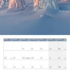 Kalenderblatt für Dezember mit beschneiten Fichten in Lappland, Finnland. Darunter eine Kalender-Tabelle mit Feiertagen.