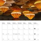 Text: Montag bis Sonntag, Dezember 2027 Kalender. Illustration: Viele gelb-orangene, hängende Laternen.