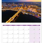 Kalenderblatt für Dezember, darunter Zahlen für Tage des Monats. Oben eine beleuchtete Stadtansicht bei Sonnenuntergang.