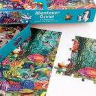"Abenteuer Ozean. Ein Puzzle mit großen und kleinen Teilen." Ein Puzzle mit bunten Meereslebewesen und Korallen.