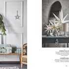 "BLUMENGLÜCK: Silber, graue Beton-Optik und Christrosen", zeigt skandinavische Dekoration mit Sternen und Tannenzweigen.