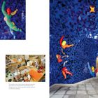 Texte: "The reliefs in the Grotto require regular restoration...French workshop." Farbige Skulpturen an blauem Mosaikhintergrund.