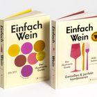 "Einfach Wein" Bücher: Links mit farbigen Kreisen, rechts mit pinkem Glas und Besteck. Autorenname: Aldo Sohm.