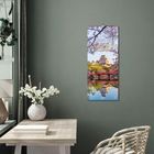 "Colours of Asia" steht auf einem vertikalen Poster, das ein traditionelles asiatisches Gebäude zeigt.