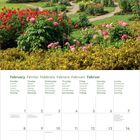 Kalender für Februar 2027 mit Wochen- und Feiertagen. Foto: Blühender Garten mit Wegen und Bäumen in einem Park.