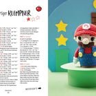 "Schnauzbärtiger Klempner". Rechts eine gehäkelte Figur, die wie ein berühmter Videospielcharakter aussieht.