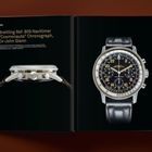 Breitling Ref. 809 Navitimer "Cosmonaute" Chronograph. Zeigt eine detaillierte Uhr mit schwarzem Zifferblatt und Lederarmband.