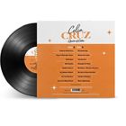 "Celia Cruz - Queen of Cuba" oben, Titelliste darunter. Schwarze Vinylplatte links, orange Cover rechts.