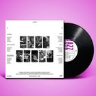 Text: "/STEREO/ A, Love Is The Way, Echoes Of A Spiritual Place, B, Labyrinth, Ancestors." Schwarze Schallplatte auf Rosa.