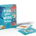 „Fish you were here“, „128 Karten“, „Das witzige Reaktionsspiel“. Buntes Design mit Hai, Krake, Aal und weiteren Meeresfiguren.
