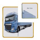 Text: "der Lkw". Drei Puzzle-Teile bilden einen blauen Lastwagen.