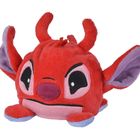 Rotes Plüschtier mit großen Augen, lustigen Hörnern und lila Ohren.