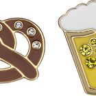 Illustration von Brezel mit weißen Steinen und Bierkrug mit gelben Steinen, beide umrandet in Gold.