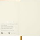Text: "OUR MANIFESTO. At Moleskine we believe in the timeless power of handwriting..."  
Ein offenes Notizbuch mit Text auf der linken Seite.