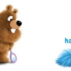 Text: "hair". Illustration: Ein flauschiger Bär hält einen Spiegel und blickt auf einen blauen, buschigen Ball.