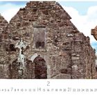 Kalendermotiv. Text: "Clonmacnoise, Klosterruine". Alte Steinruine und keltisches Kreuz im Hintergrund.