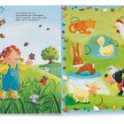 „Unsre kleine Ida hier hat bestimmt ein Lieblingstier.“ Illustration einer Wiese mit Tieren und einem Kind.