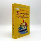 "Der schwimmende Blumenladen von Amsterdam" auf gelbem Hintergrund; Illustrationen von Blumen und einem Boot.