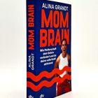 "ALINA GRANDT MOM BRAIN. Wie Mutterschaft dein Gehirn verändert und du deine volle Kraft aktivierst." Dreidimensionales Buchcover.