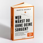 Buchtitel "Wer wärst du ohne deine Sorgen?" von Martin Wehrle, orangefarbener Einband, Illustration eines Bergsteigers.