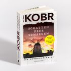 „Schatten über Sømarken“ von Michael Kobr; Ein Bornholm-Krimi. Cover zeigt eine Windmühle bei Sonnenuntergang.
