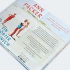 Cover eines Buches mit dem Titel "Ein größerer Wunsch" von Ann Packer. Auf dem Bild sind drei Personen am Strand.
