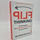 „FLIP THINKING“ steht in großen roten Buchstaben, darunter „15 Strategien, um Probleme in Chancen zu verwandeln“.