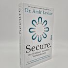 Das Buch "Secure" von Dr. Amir Levine zeigt auf dem Cover ein kreisförmiges Magnet-Symbol.