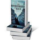 „Der Bonbonmord zu Köln“ von Eva-Maria Silber und Kirsten Wilczek. Historischer Kriminalroman, gedruckt auf mehreren Büchern.